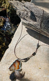 Agates enhanced by a Feather Silver Accents on a Rope Necklace