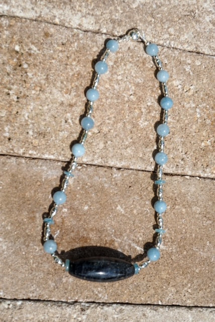 Aquamarine and Silver Necklace enhanced with a Fossilized Coral Center