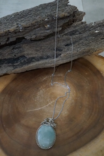 Sterling Silver Necklace enhanced with an Aquamarine Pendant