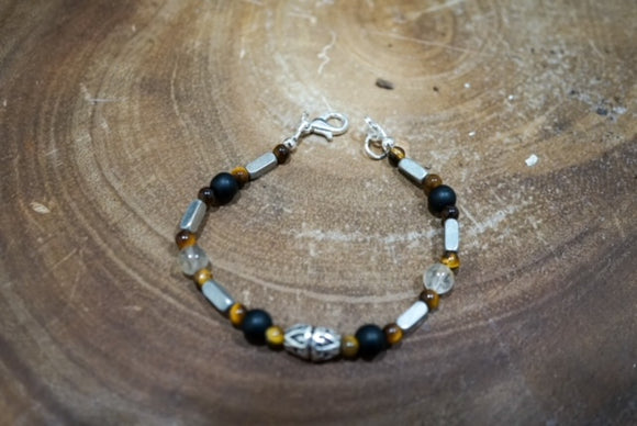 Sterling Silver Bracelet enhanced with Tiger Eye, Onyx and Topaz