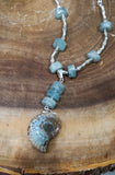 Sterling Silver Necklace with Aquamarine and Ammonite Fossil Pendant