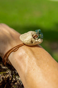 Leather bracelet with Sea Stone enhance with Green Quartz