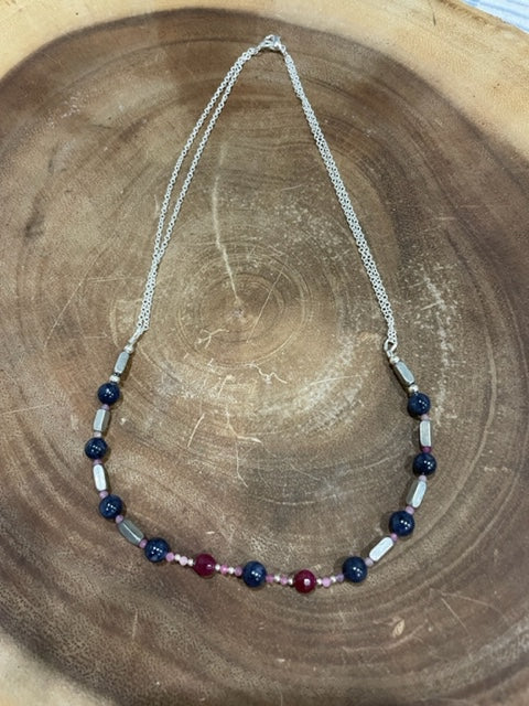 Sterling Silver Necklace enhanced with Sapphires and Rubies
