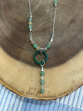 Sterling Silver Necklace enhanced with Jade and Topaz